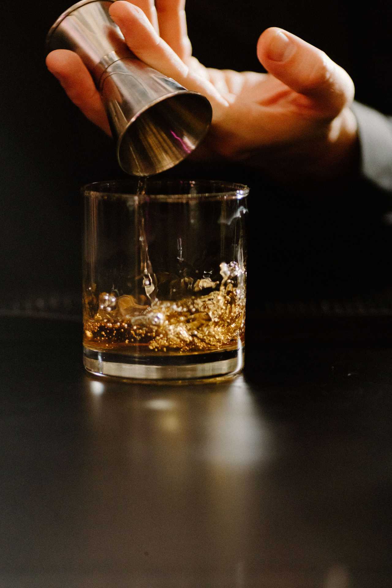 Pouring Rabbit Hole Cavehill Bourbon at Foodism 40