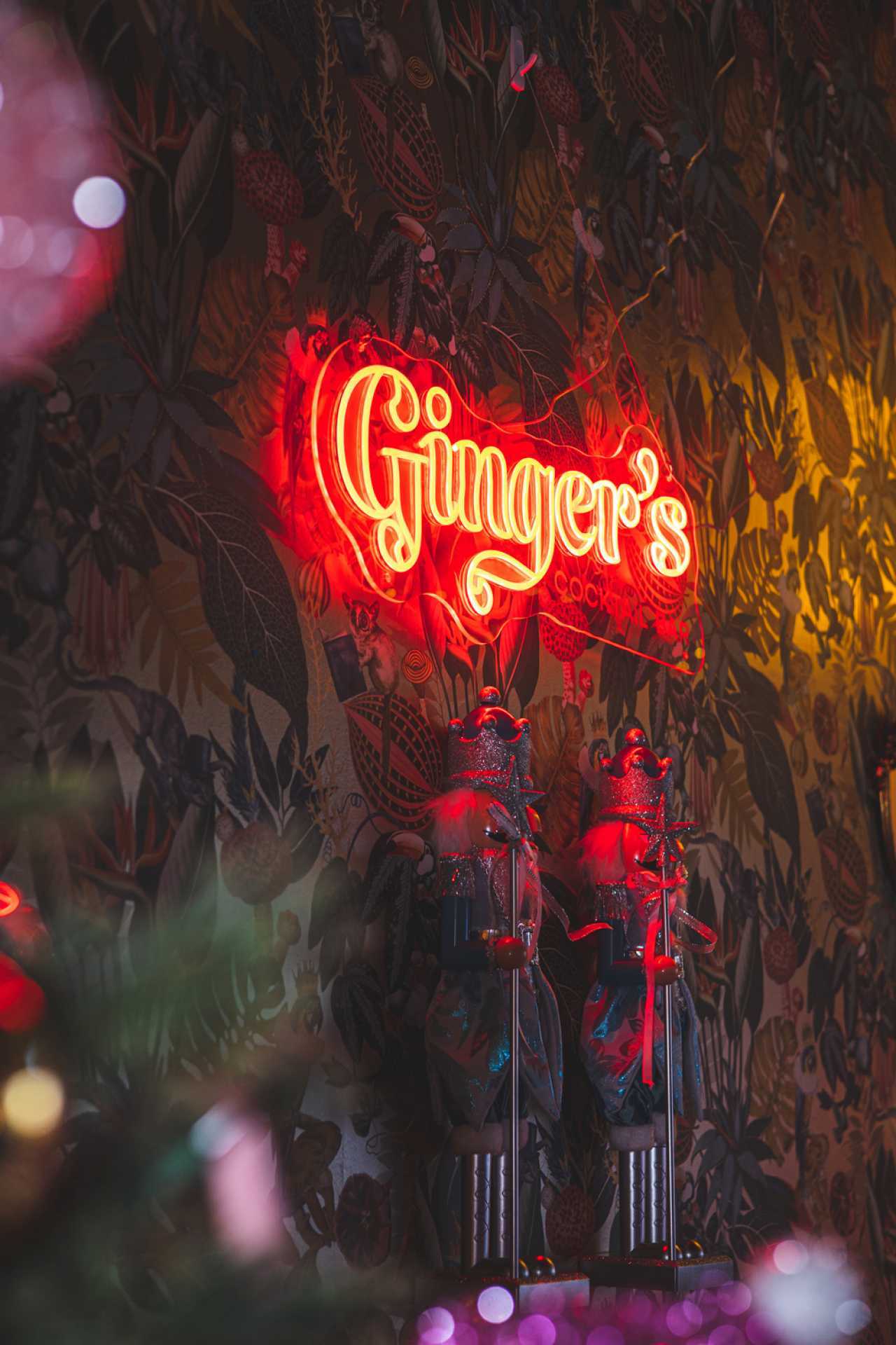 Best Christmas bars and markets in Toronto | A neon sign inside Ginger's Cocktail Bar