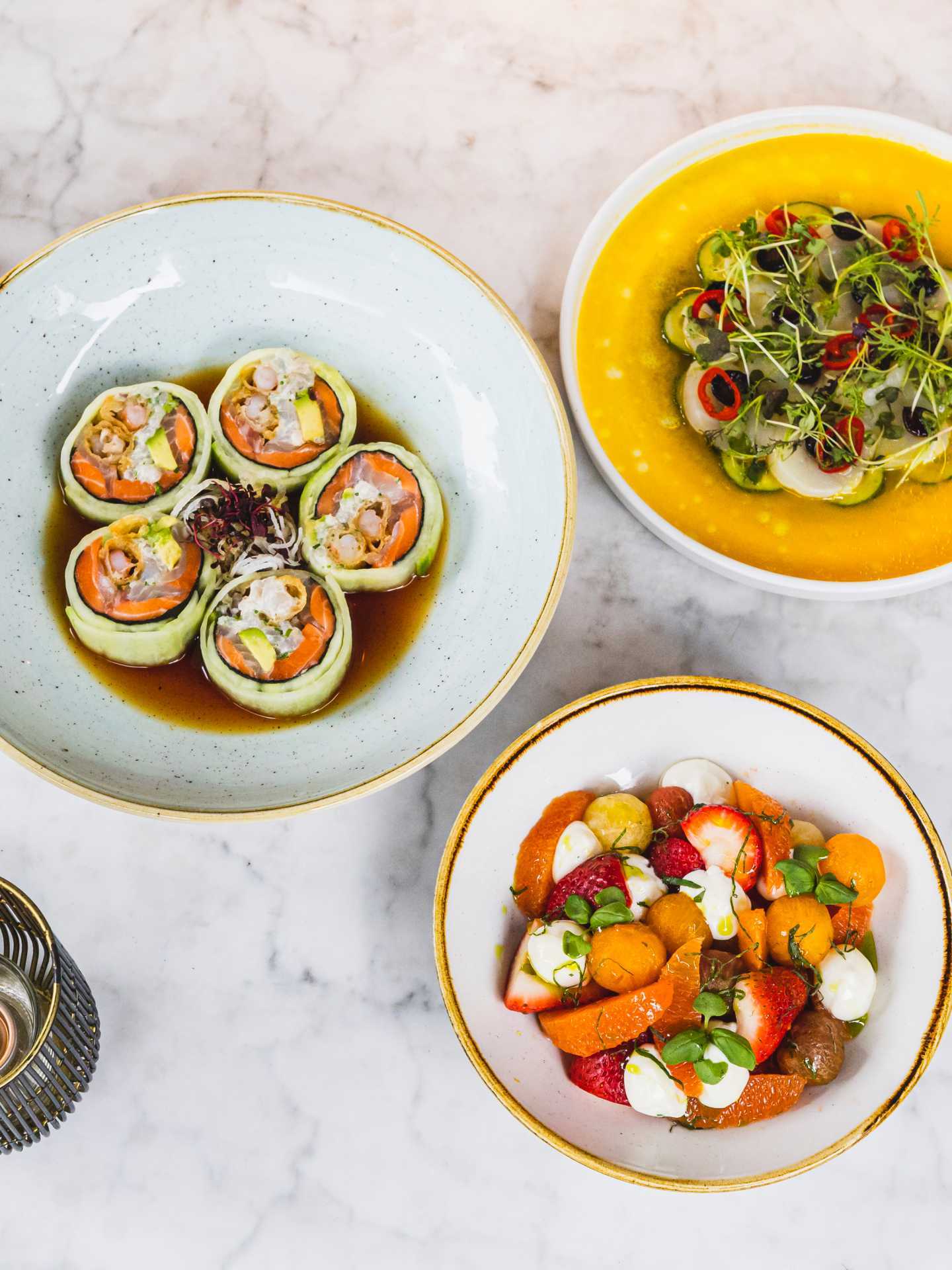 Best patios in Toronto | An assortment of dishes on the patio at Kasa Moto