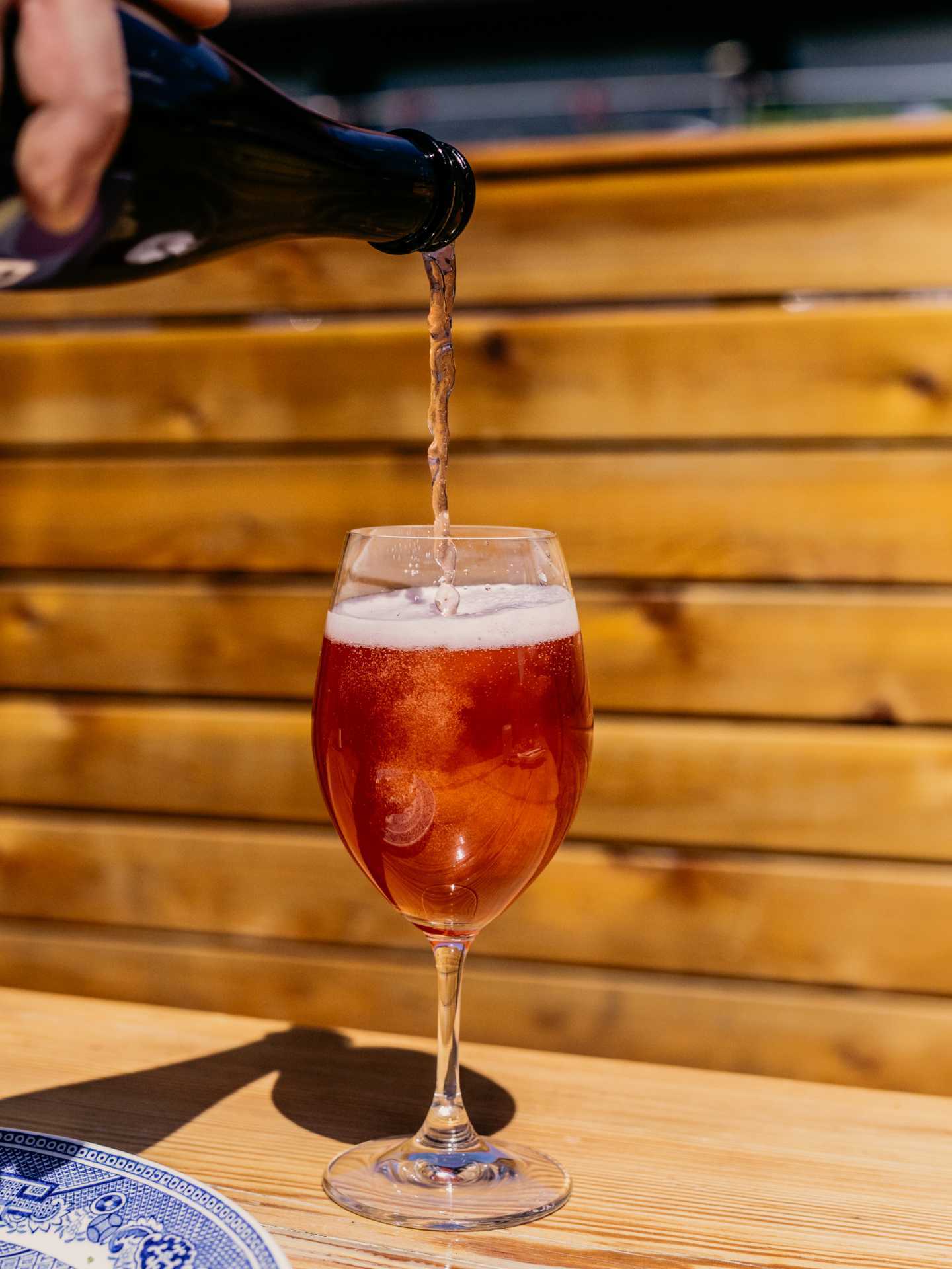 Toronto breweries | A drink being poured at Burdock Brewery