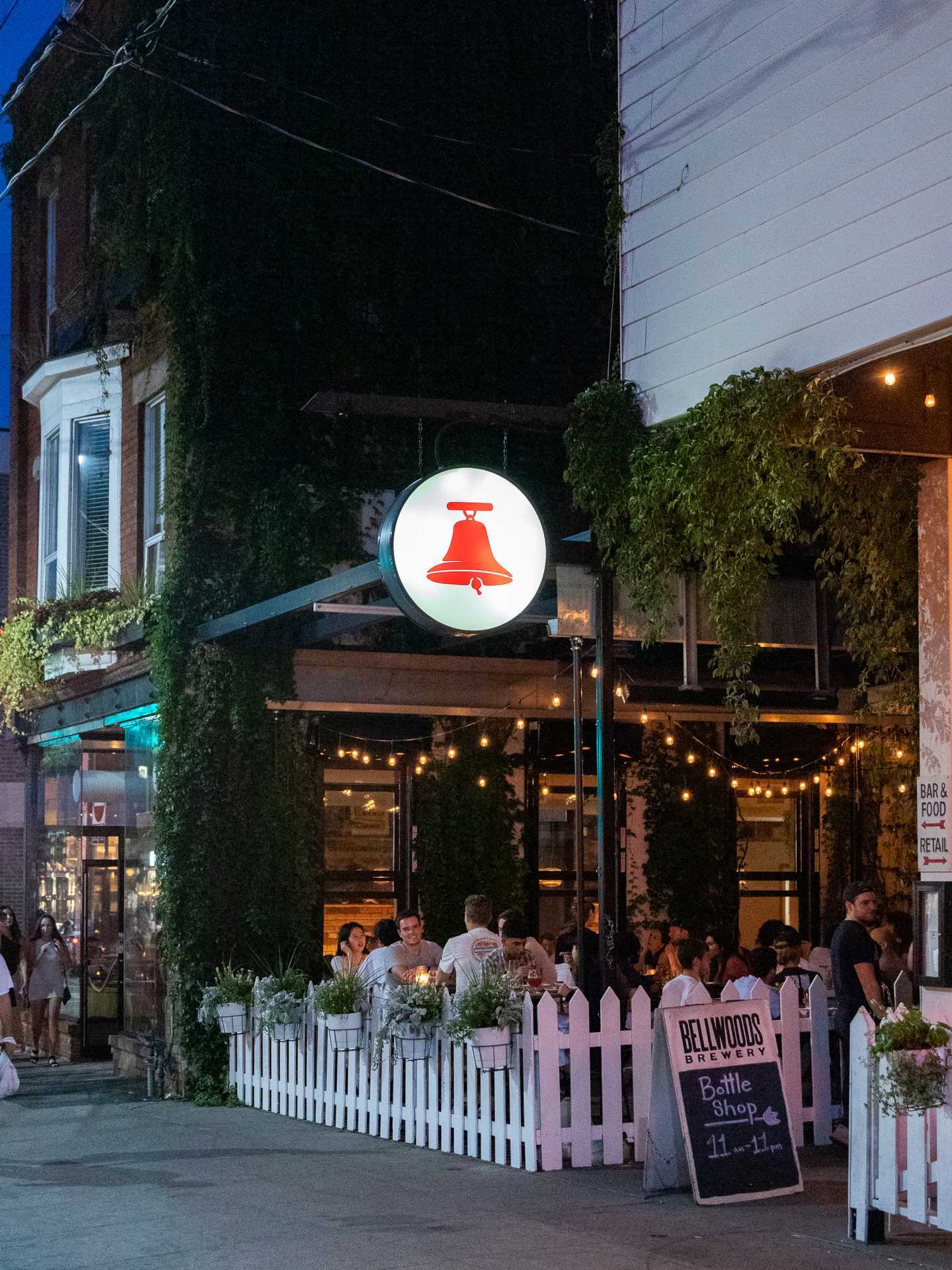 Toronto breweries | The patio and hanging sing outside Bellwoods Brewery
