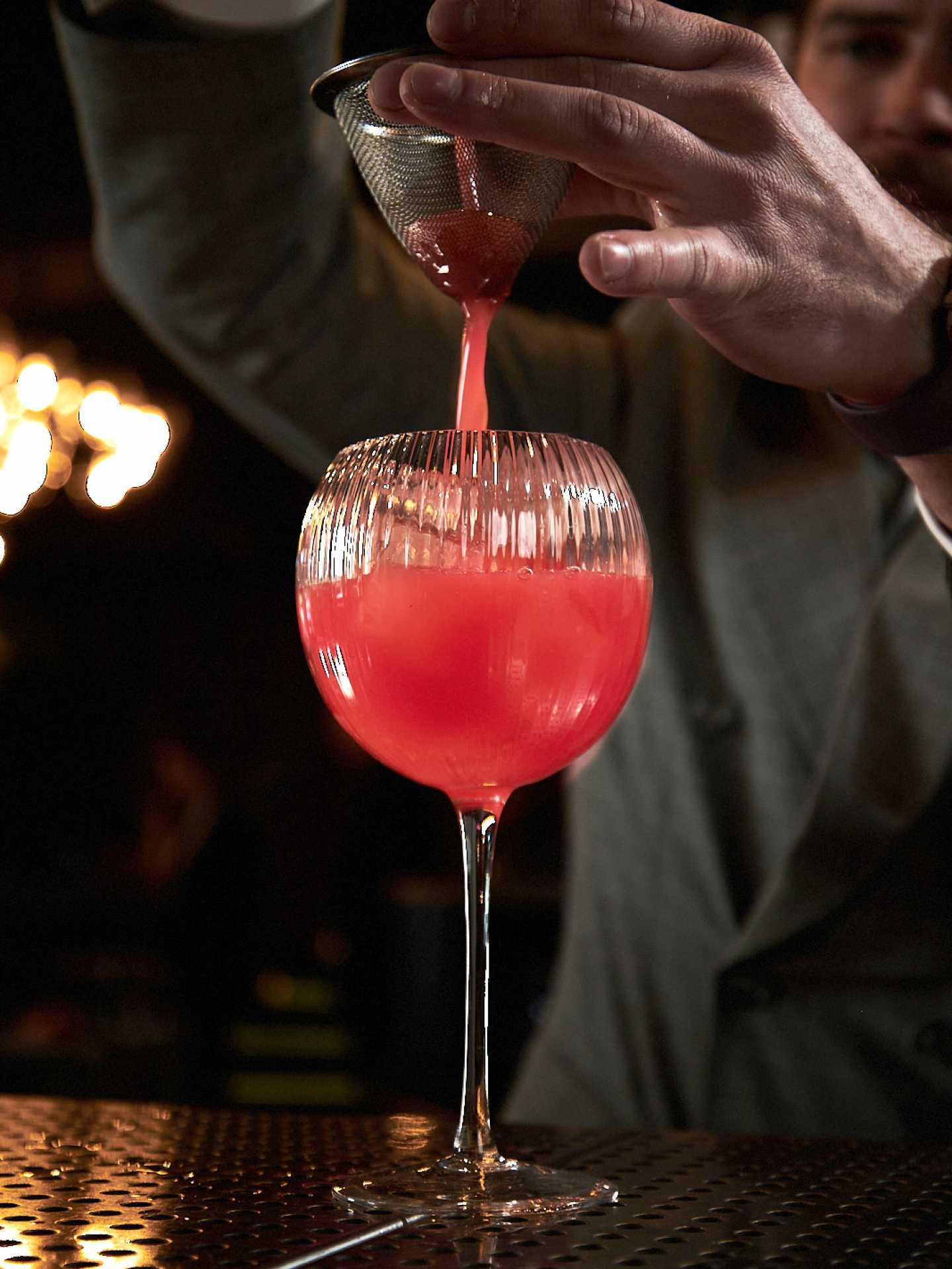 Best happy hours in Toronto | A red cocktail at Chotto Matte
