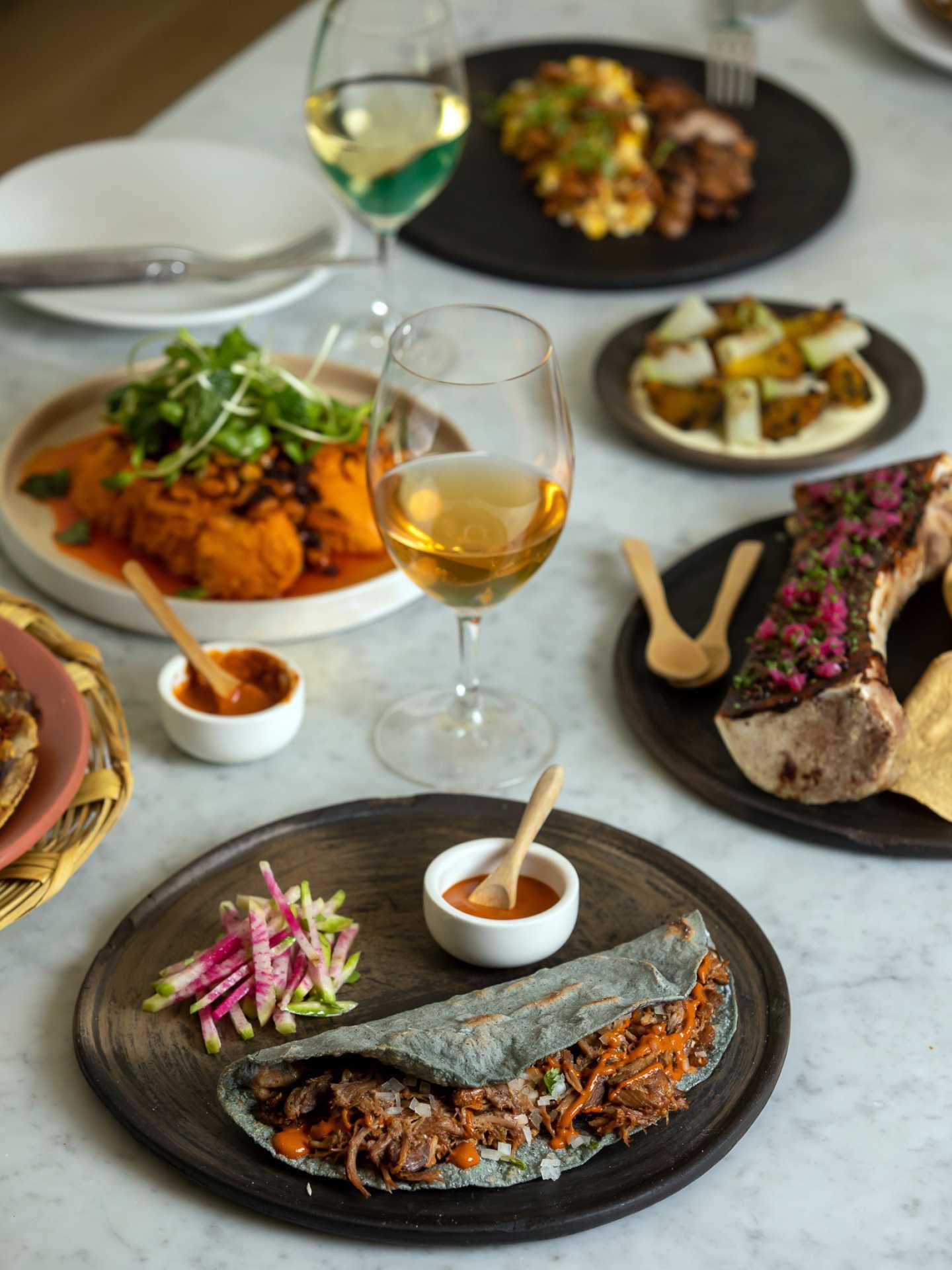 Best restaurants Toronto | A spread of dishes at Quetzal