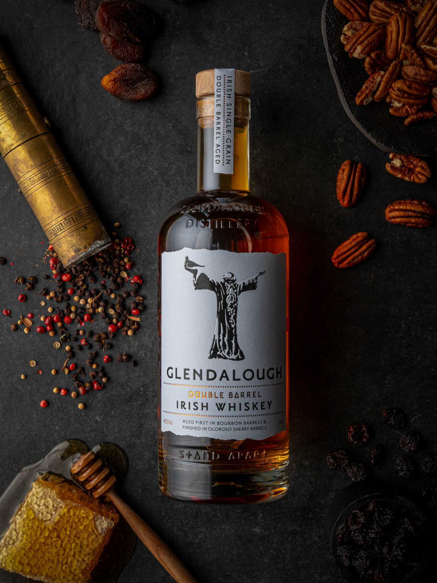 A bottle of Glendalough Double Barrel Irish Whiskey with honey, pepper and pecans