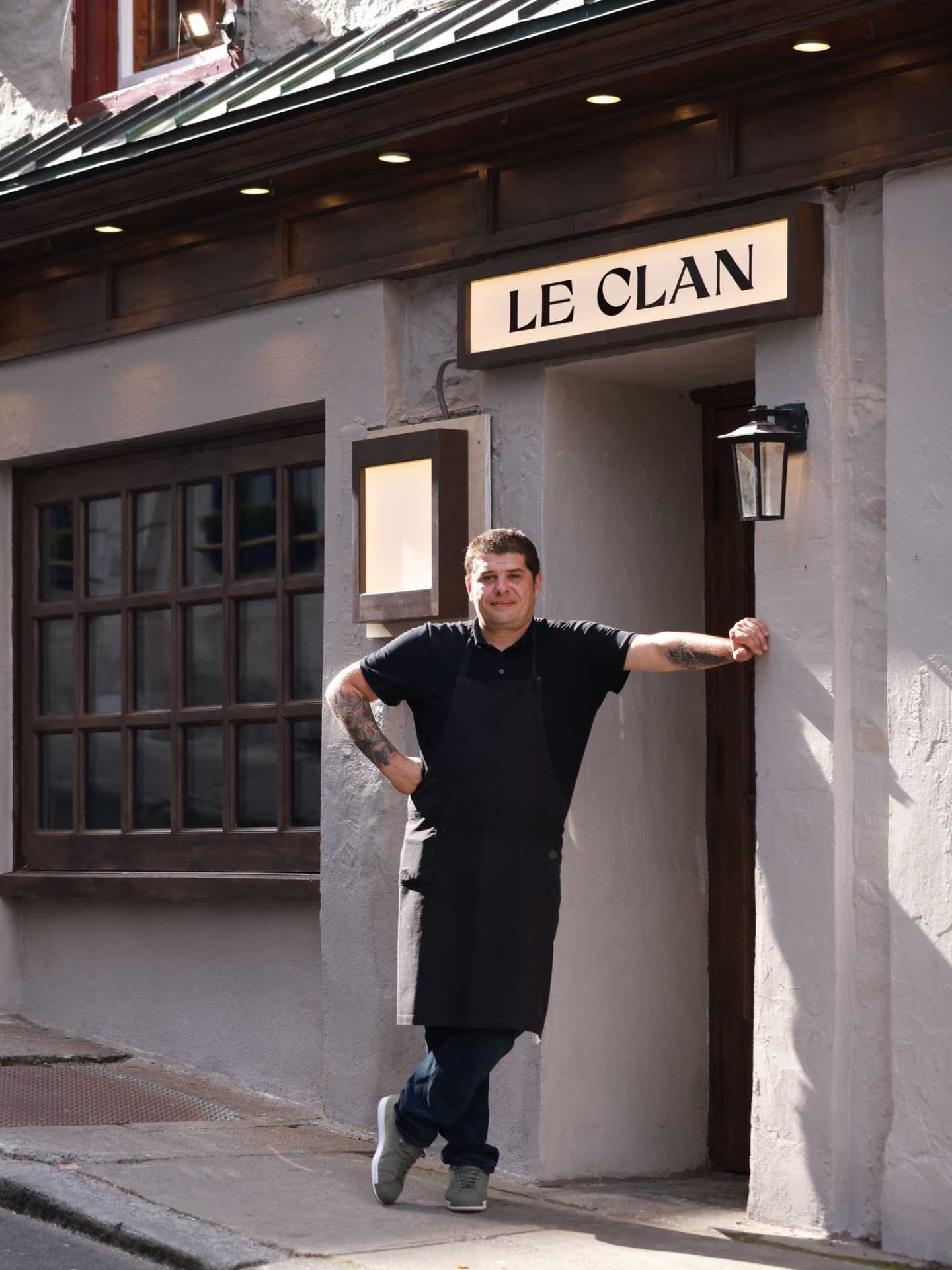 Chef Stéphane Modat standing outside of Restaurant Le Clan in Québec City