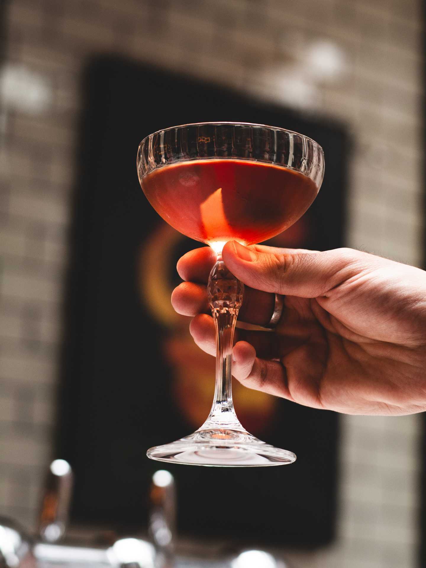 Best new Toronto restaurants | A red cocktail at Cafe Renee in Toronto