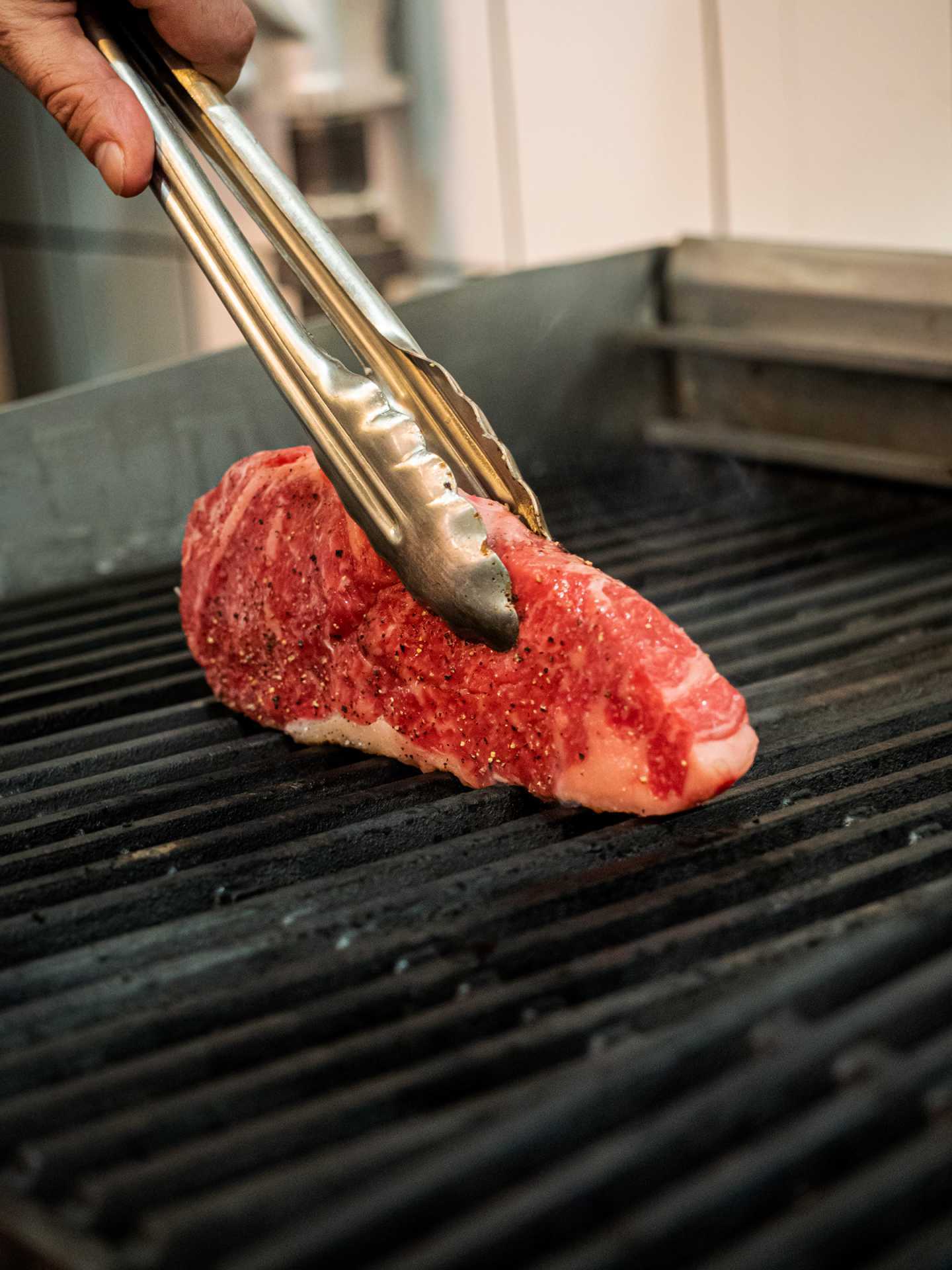 Best new Toronto restaurants | Raw steak on the grill at J's Steak Frites