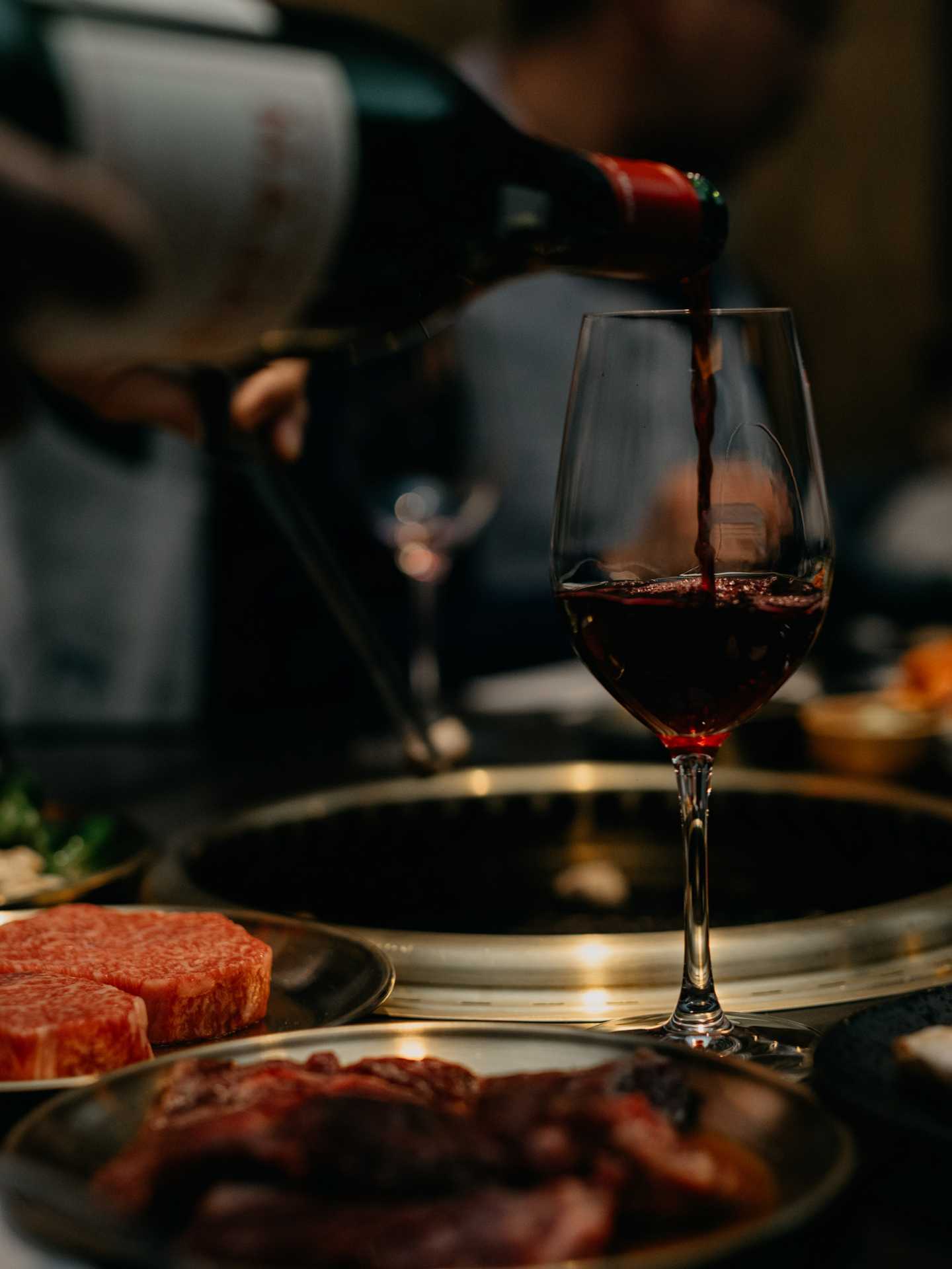 Best new Toronto restaurants | Serving red wine at Takja BBQ House
