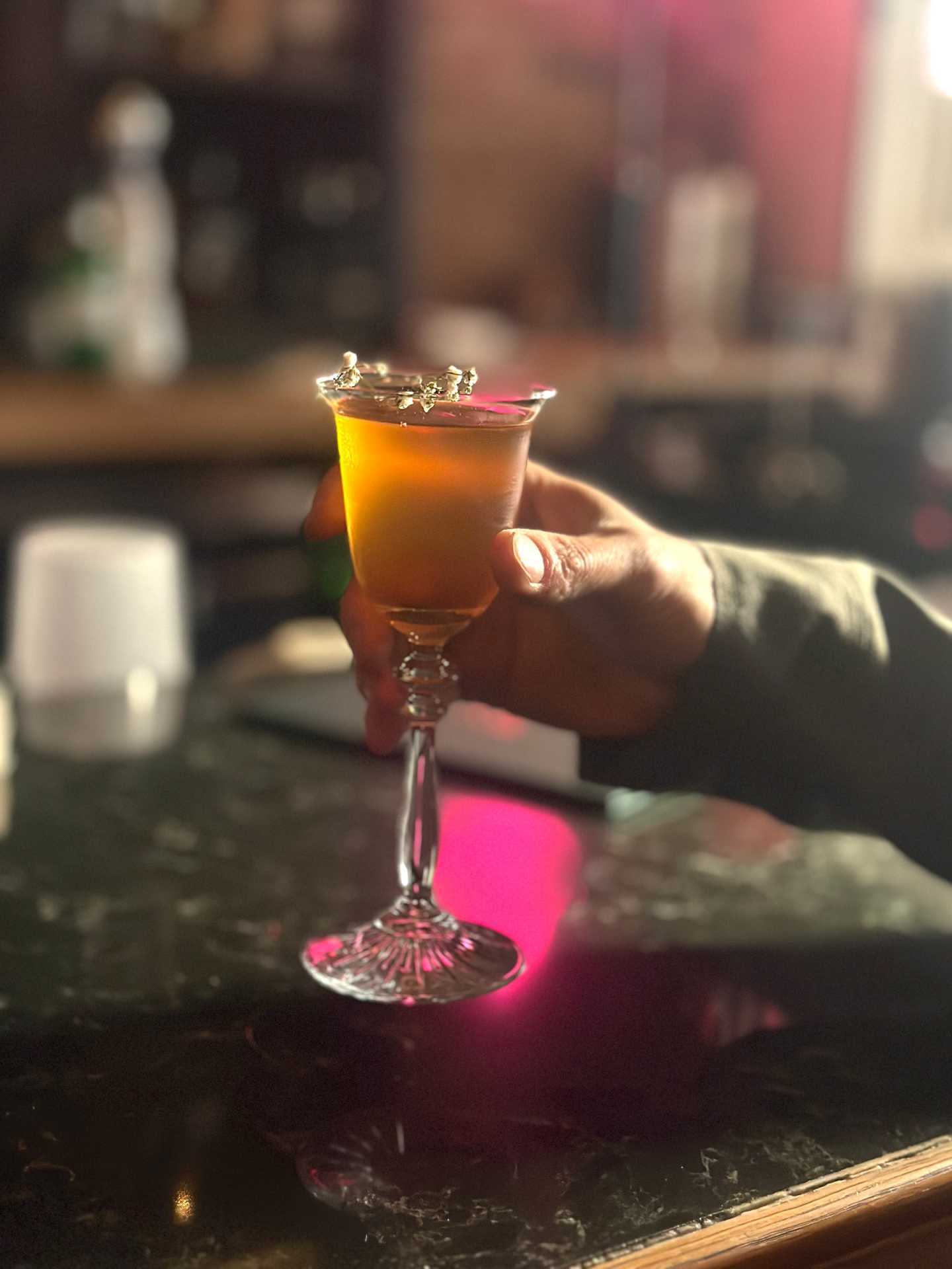 Best new Toronto restaurants | An orange cocktail at Wolfie