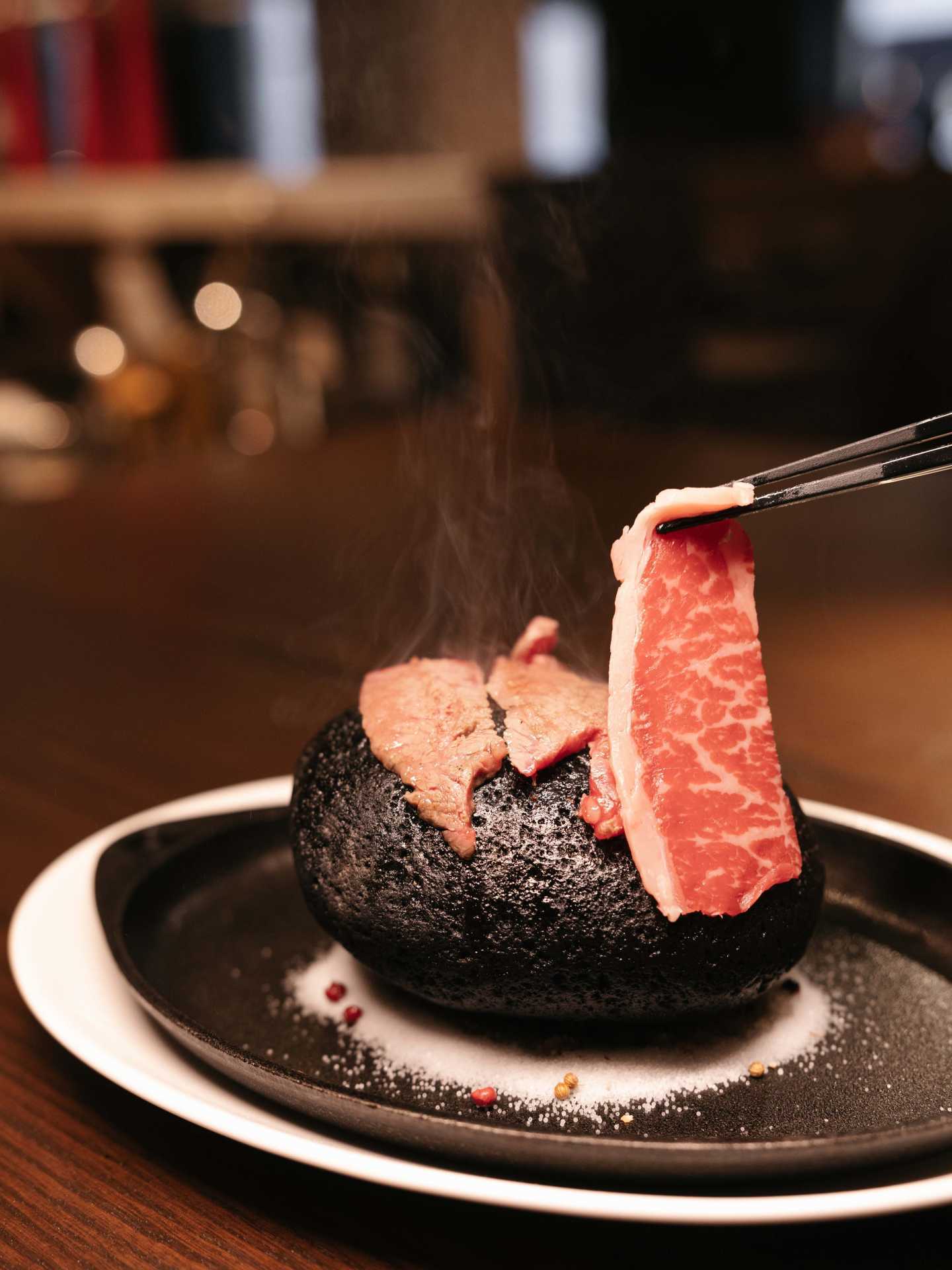 Thin strips of premium beef at Blue Bovine Steak + Sushi House