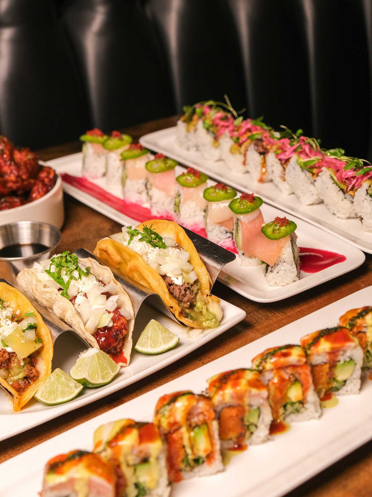 Best Winterlicious Toronto 2025 restaurants | Assorted tacos and sushi at Saku