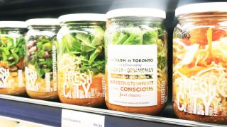 Salad jars on the shelf at Fresh City Farms