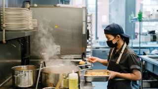 Toronto restaurant industry recovery | Someone works in the kitchen at Ascari on King