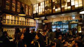 Best bars in Toronto | A bustling crowd inside Bar Volo