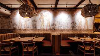 Toronto's best Greek restaurants | East dining room mural at Myth