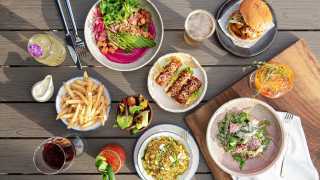 Accessible restaurants in Toronto | A spread of food at SOCO