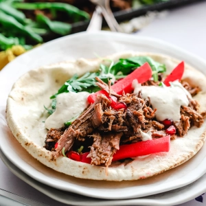A veal shawarma with beets and creamy sauce