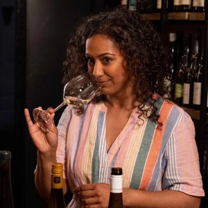 Nabilah Rawji smelling a glass of riesling