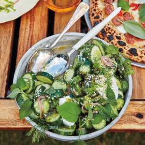Cucumbers with herby yogurt dressing and sesame seeds recipe