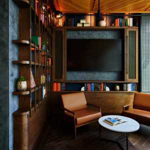 New Toronto restaurants | A TV, bookshelf and loungers at TABLE Fare + Social