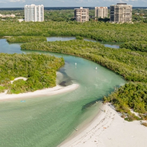 A stunning beach and highrise buildings on Florida's Paradise Coast