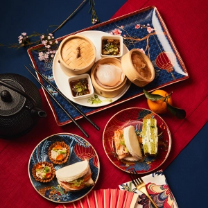 A spread of savoury snacks, bamboo steamer baskets and tea at Holts Café Lunar New Year Afternoon Tea