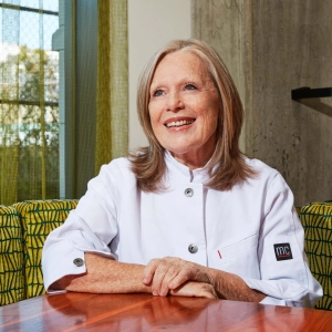Donna Dooher smiling and looking off into the distance