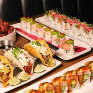 Best Winterlicious Toronto 2025 restaurants | Assorted tacos and sushi at Saku