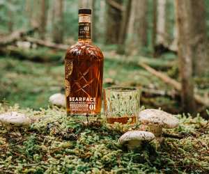 Bearface Matsutake whisky | A bottle of Bearface Matsutake and a glass in the forest