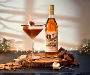 A bottle of Yellowstone Select Kentucky Straight Bourbon Whiskey with an Espresso bourbon-tini cocktail