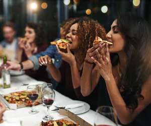 Fine Dining Lovers The Dining Out Survey | Women eating pizza