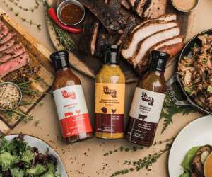 Win a Shop The Carbon Bar gift card | A spread of meat, chicken, burgers and BBQ sauce from The Carbon Bar