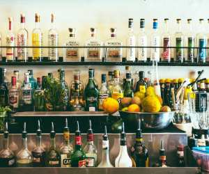 Alcohol delivery in Toronto | Alcohol bottles behind a bar