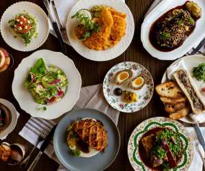 Restaurant Review: The Rabbit Hole, a whimsical British pub | A spread of British dishes at The Rabbit Hole