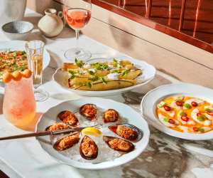 Restaurant review: Toronto Beach Club | Assorted appetizers and signature cocktails