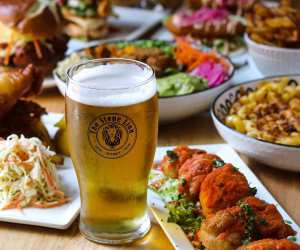 Estrella Damm Culinary Journey | A spread of food and beer at The Stone Lion