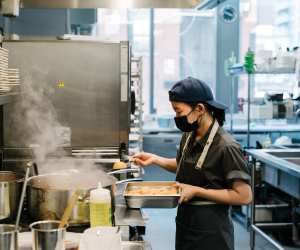 Toronto restaurant industry recovery | Someone works in the kitchen at Ascari on King