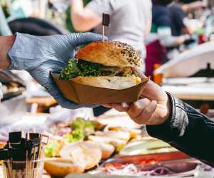 T.O. Food & Drink Fest | A vendor serves a hamburger