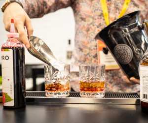 Win two tickets to SIAL | A bartender makes drinks