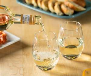 Spring drinks | Pouring Tierra Rica Sauvignon Blanc Organic into two glasses