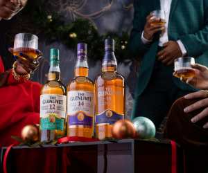The Glenlivet | A collection of The Glenlivet scotch at a festive party